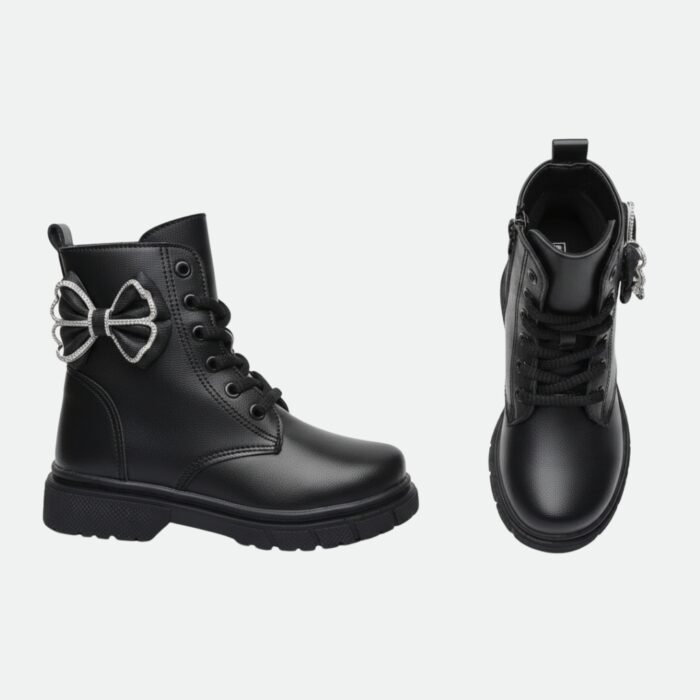 بوت نسائي أسود أنيق برباط ولمسة فيونكة – تصميم عصري وراحة مثالية